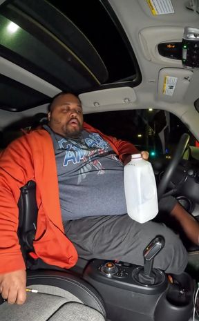 Fat guy in a little car and chugging some half and half. Gains coming back stronger this time.