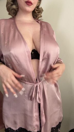Rose in a sexy robe reveals her body to the camera.