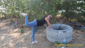 MILF Pissing in her jeans while exercising outdoor