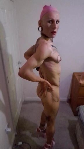 Sexy tanned bitch on pink high heels