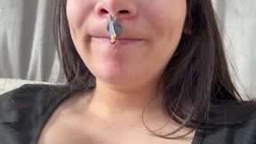 giantess girl puts her tiny husband on her nose and he lies there like a piece of snot, then she starts licking it and puts it to her earlobe because it s so funny that she puts her tiny husband where