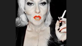 Smoker queen Joan pulls her marlboro red 100 very closly so sexy between her bright red juicy lips that glows just like her red bra