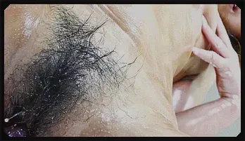 Akiho Nishimura stuffs her mouth and twat with a toy cock