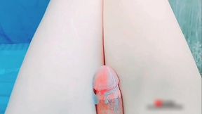 Sweet sissy holding tiny cupcake with pink frosting