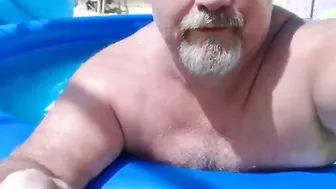 Naked Daddy Bear Relaxing by the Pool