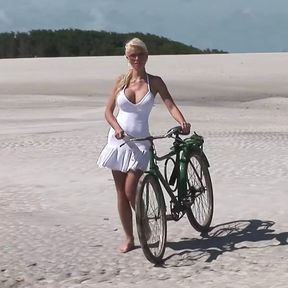 Passionate fucking on the beach with a stunning blonde with big tits