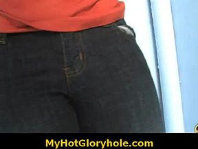 Ebony girl gets initiated in the art of gloryhole blowjob