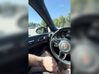 Jerking off in public parking lot. Cum on Porsche steering wheel.