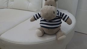 A plush toy on my crossed legs bb