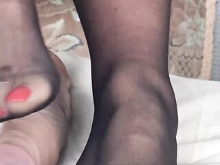 Mrs Aged Feet showing all her feet lovers her soles and toes in sheer Ebony Hold Ups. Part 1