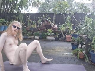 Nudist stretching with his morning wood to begin the day
