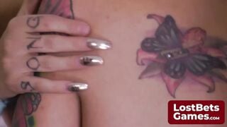 Blue-haired Carmen and friends playing a game of Strip Freeze