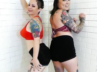 NIKKISFETISHES 2 tattooed brunettes in underware pose jointly inside tiled washroom