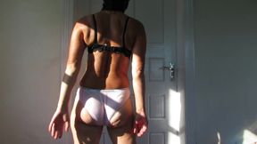 Muscular sexy lady cleaning