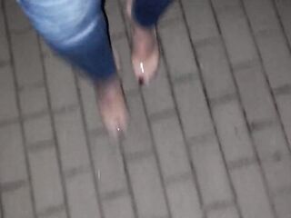 crossdresser tempts with her hawt feet in stripper shoes on the street