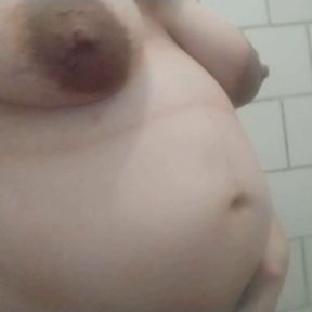 8-months pregnant teen with huge boobs in public shower