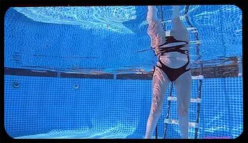 Sensual Underwater Striptease in the Pool