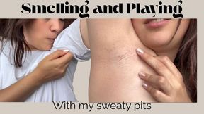 Smelling and playing with my sweaty pits