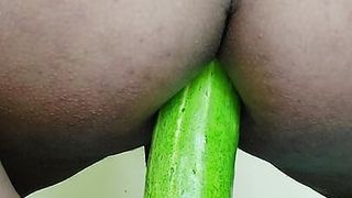 Sissy playing with cucumber and getting her ass ready for big cock
