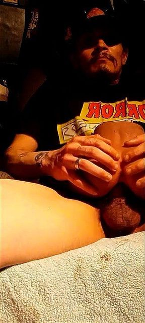 Masturbating