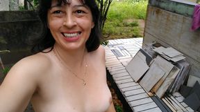 Wife walking naked outside. She makes pee and touch herself.