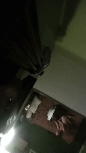 Blonde solos in her plain bedroom