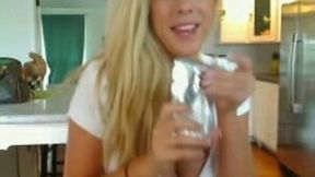 Sexy blonde hottie in the kitchen feels horny for boob flash