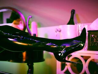 Latex Mama Master-whore Penny Barber Lubes Up Her Boobs and Vagina