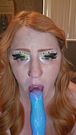 Redhead girlfriend gets up close and personal with her dildo. Deepthroat and ASMR sounds galore