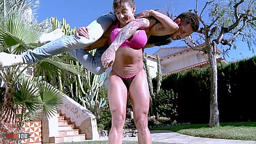 Argentinian muscular MILF lift and carry with young guy