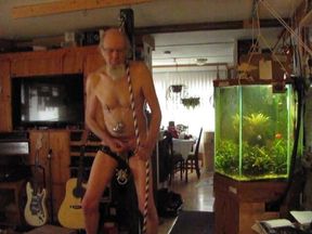 Masturbating on the slave post
