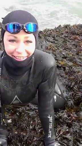 Rubbery Beach Encounter: Lucy's Neoprene Pussy Play with Stranger
