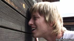 Busty blonde granny pleases horny stranger on public