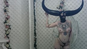 horned latex mask and pvc striptease