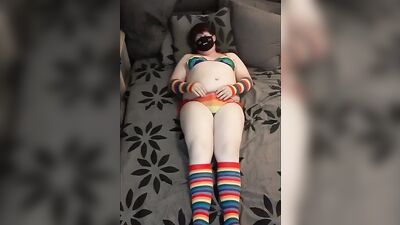 Masked femboy is having fun in front of the camera