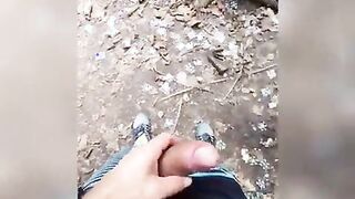 Displaying his trouser snake in the park.
