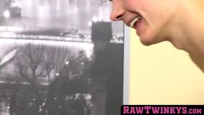 Sexy twink lies on the bed while his lover hits him in the ass