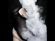 Curvy goth vaping in sheer outfit