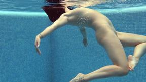 ”Czech beautiful babe Lady Dee takes her shorts off in the pool”