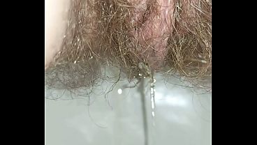 I'_m taking close-ups of myself peeing in the toilet