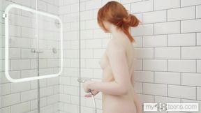 Redhead girl with great ass fingering her pussy