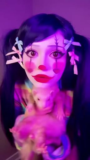 Hilarious clown girl with thick thighs and big ass shows off her small tits