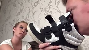 Man smelling dirty sock