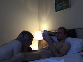 Wifey sucking his cock while he is answering his mails