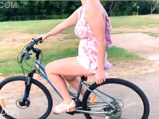 Wife rides bike in public cleavage flashing dare