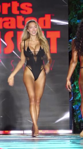 Bikini-clad celebrity model shows off her big tits in a swimsuit