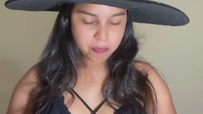 Sexy witch blowing bubbles gum