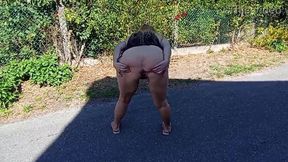 Lingerie-clad goddess masturbates outdoors