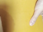 Small dick masturbating with oversize condom on male solo