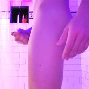 Twink playing with a dildo in the shower